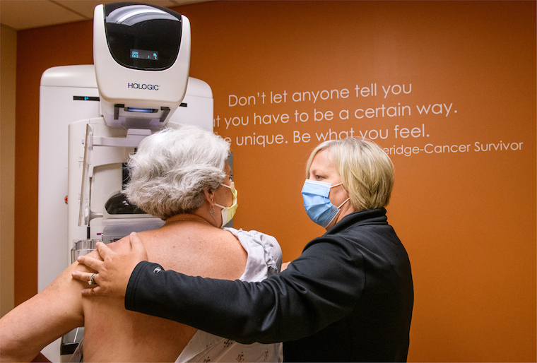 photo of woman getting mammogram