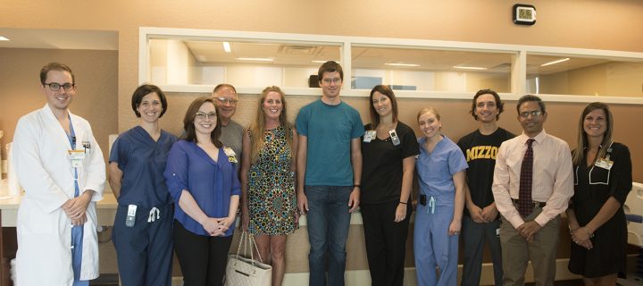 Casey O'Connor (center, t-shirt), his parents and care team.