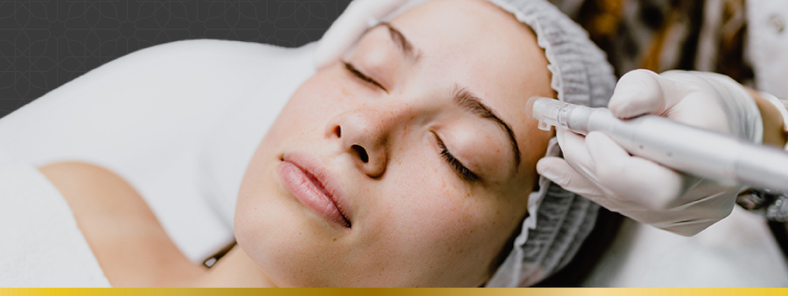 Woman laying down getting a microneedling treatment