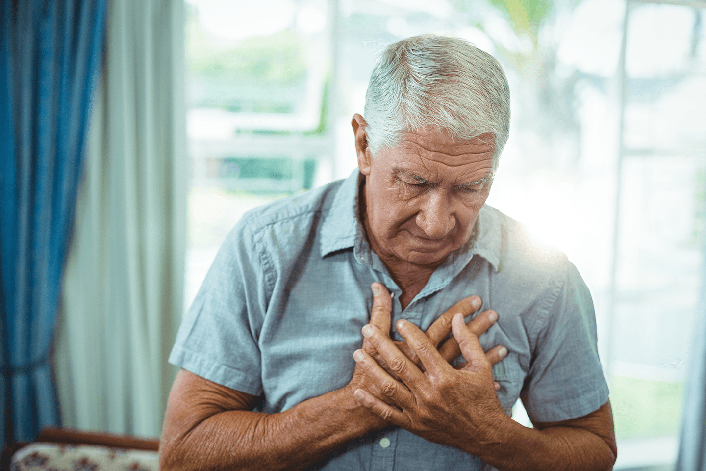 photo of man with chest pain
