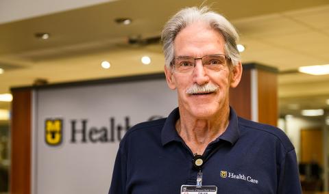 photo of Dean Bell volunteering at MU Health Care