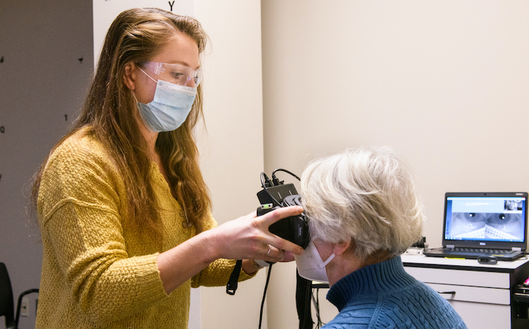 photo of mu health care neurologic physical therapist working with patient