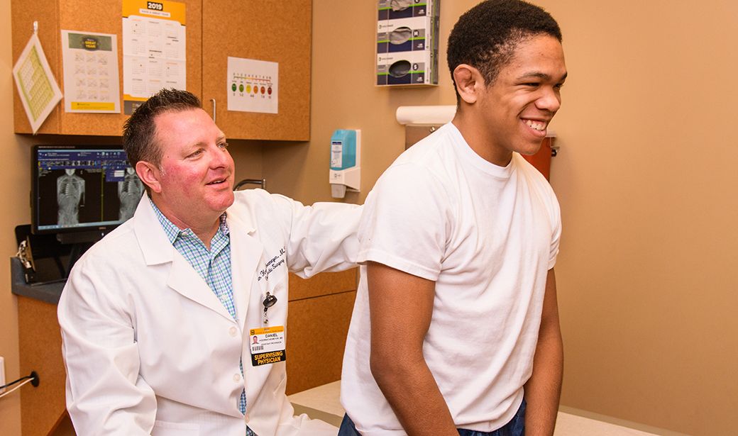 Dr. Hoernschemeyer, MD, examines Terrence Brown