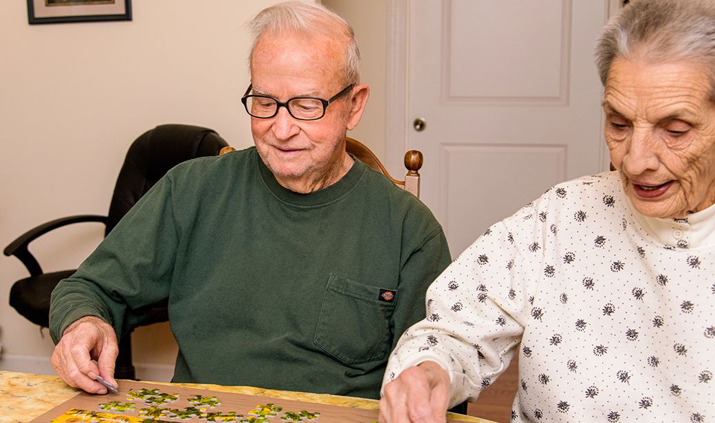 Ralph and Lola enjoying putting together jigsaw puzzles