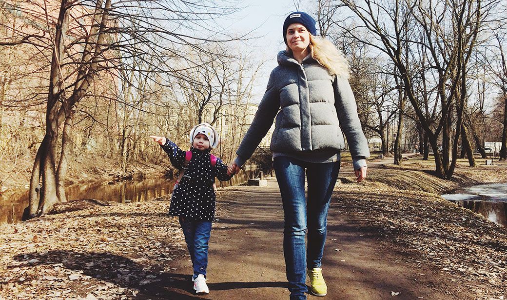 Mom, Daughter Walking in Winter