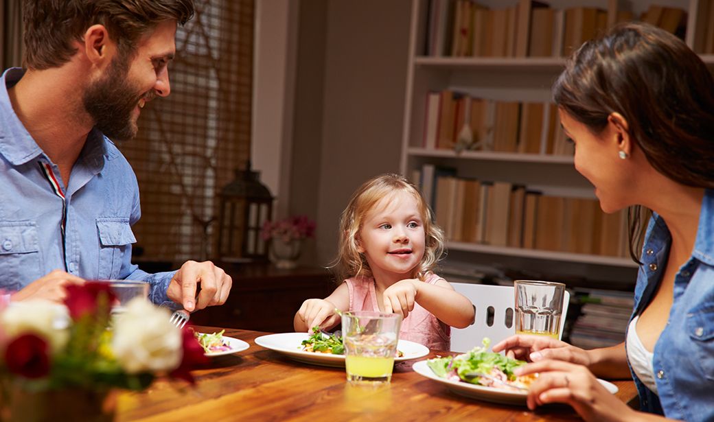 parents eating in living room