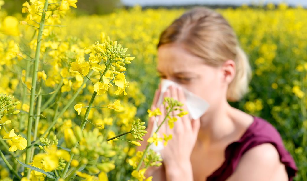 Woman sneezing