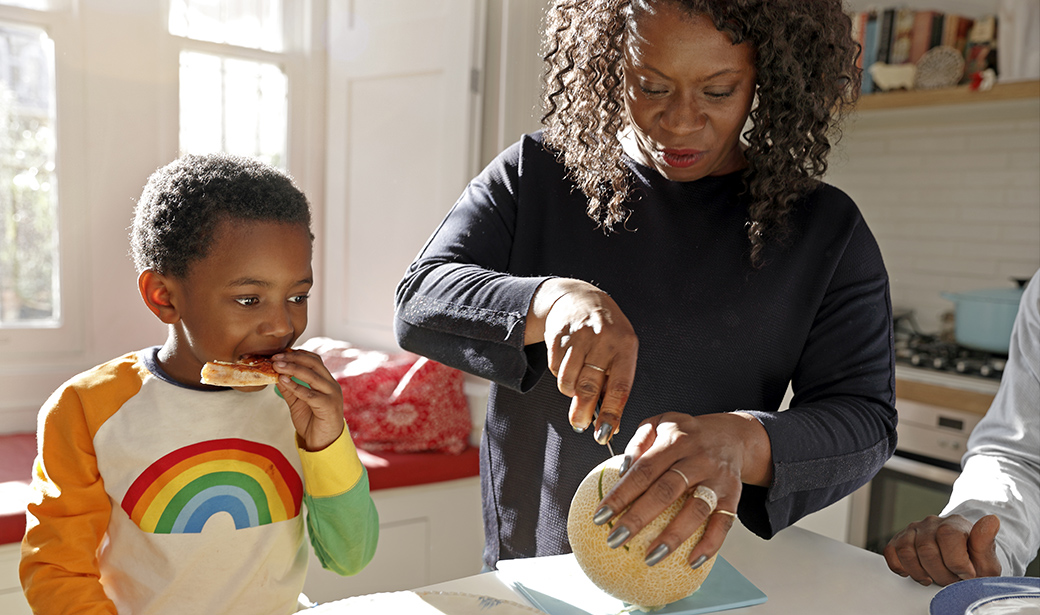 Parents and kids making lunch