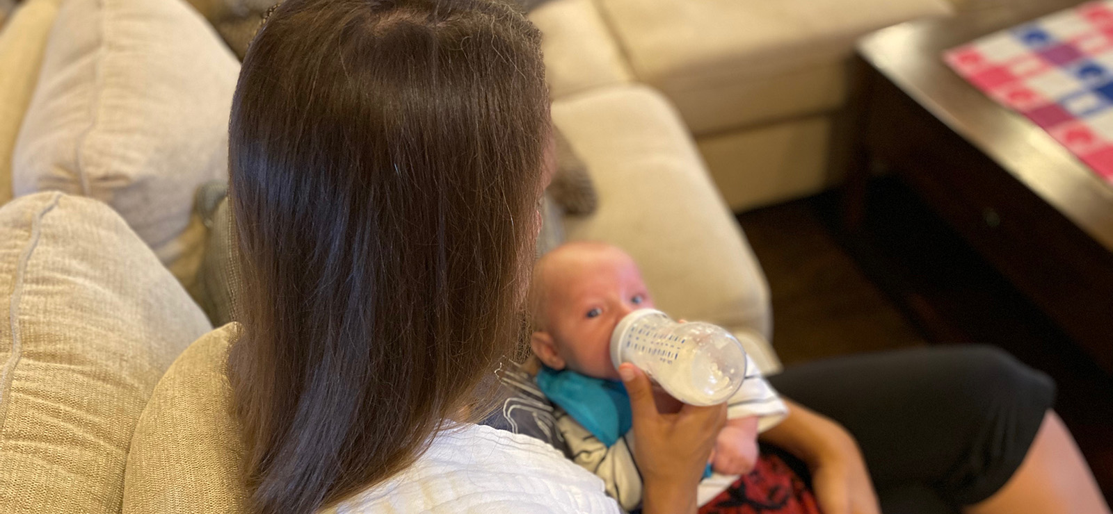 woman feeding baby