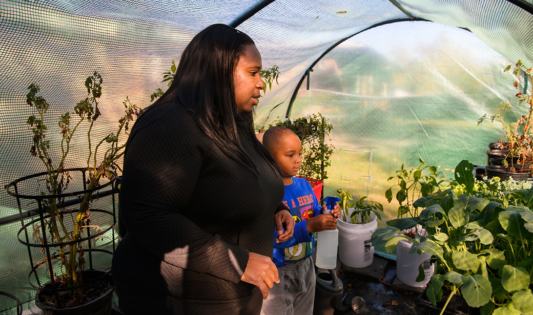 Enjoli Dixon in her greenhouse garden.