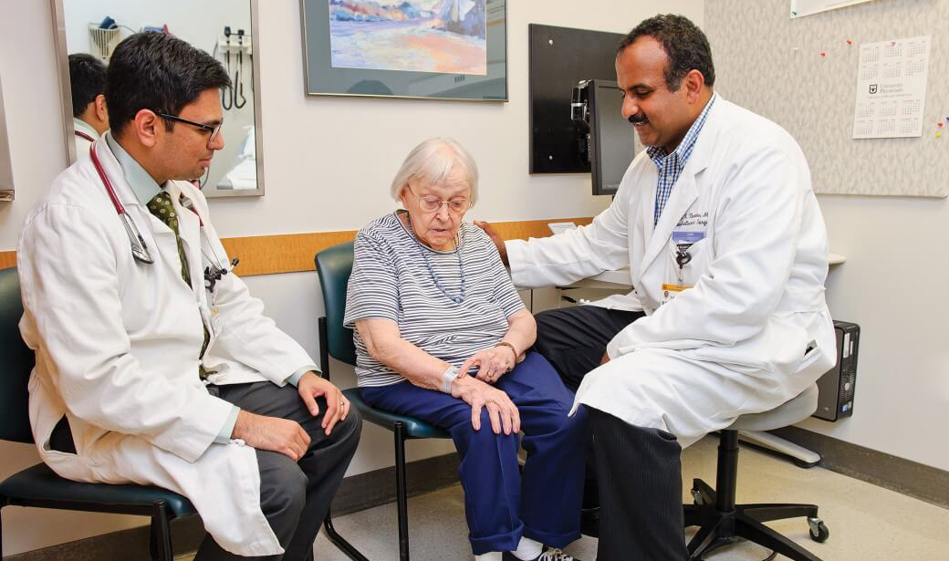 photo of doctors with patient