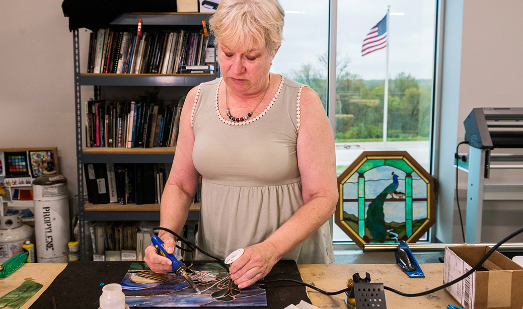 Teresa Woody, a retired veteran of the Air Force and Navy, enjoys making stained glass art work in her spare time.