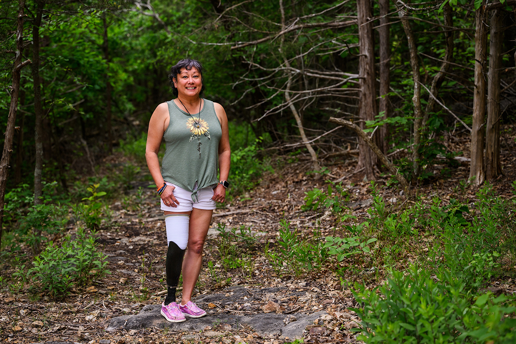 A photo of a woman outdoors.