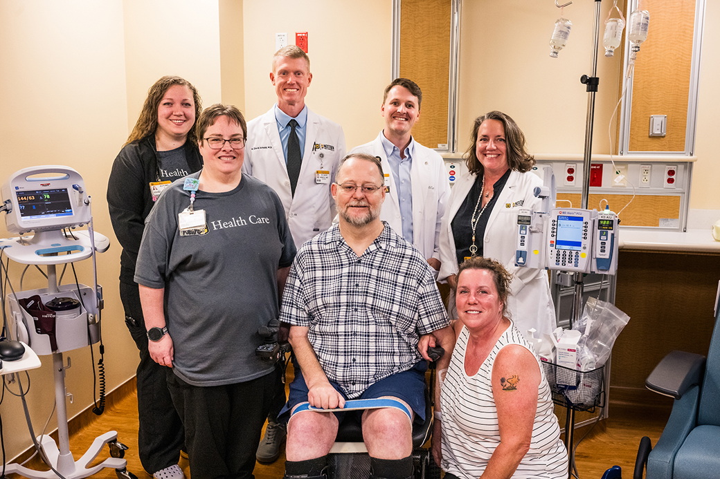 A photo of Toby with his family and MUHC faculty.