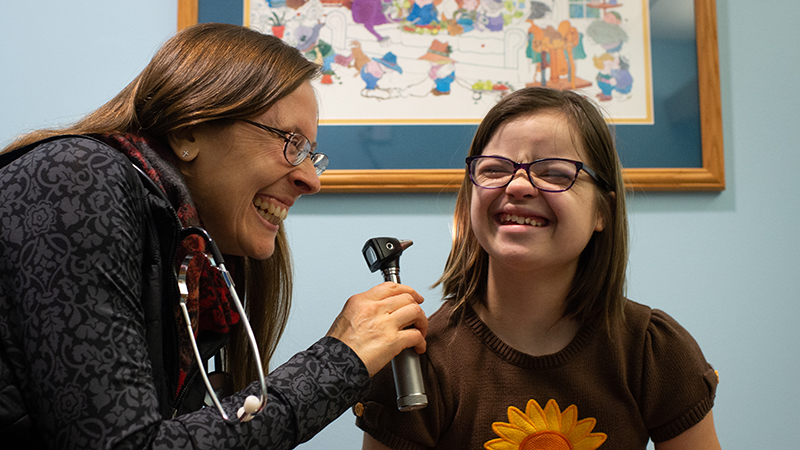 Dr. Tracy Stroud with a patient at the Thompson Center patient