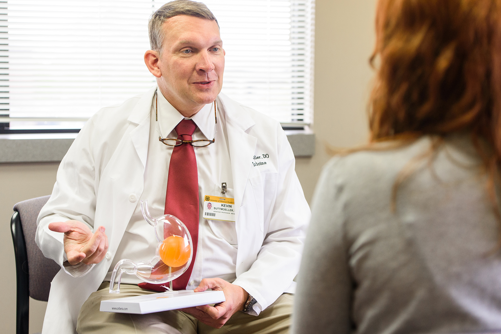 photo of Dr. Suttmoeller and patient