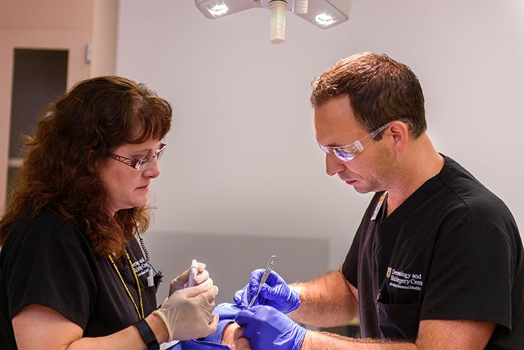 photo of Dr. Golda and skin cancer patient