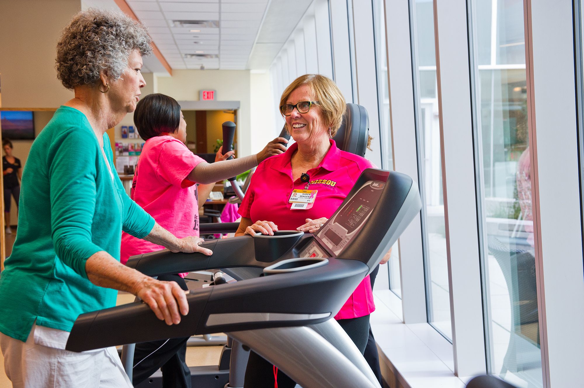 photo of cancer rehabilitation therapist and patient