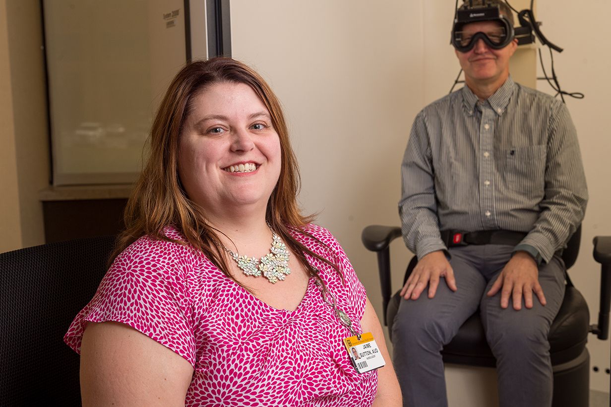 photo of audiologist and patient