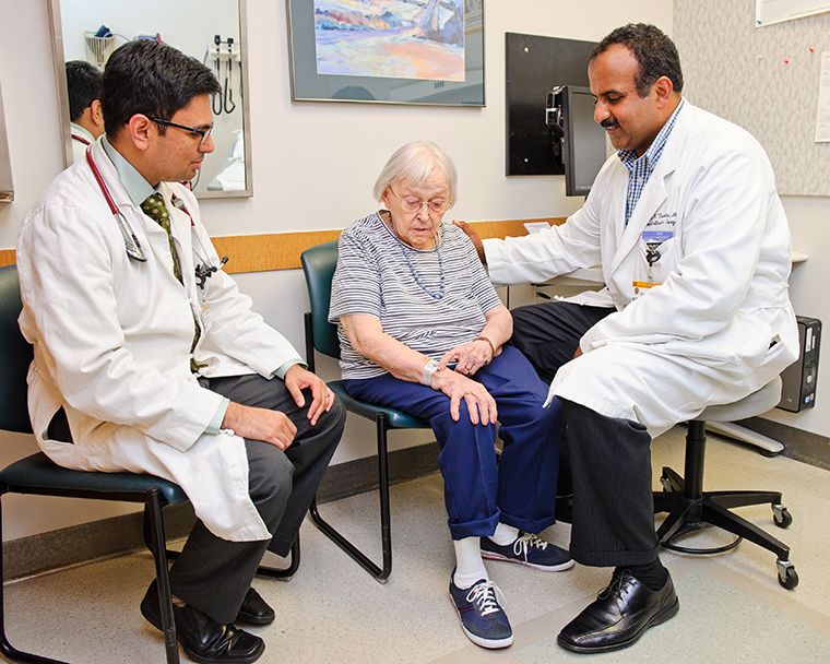 photo of doctors and patient