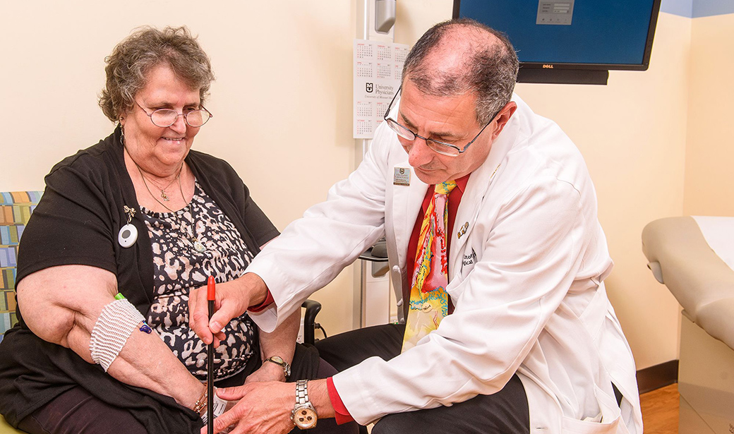photo of Dr. Litofsky and brain cancer patient