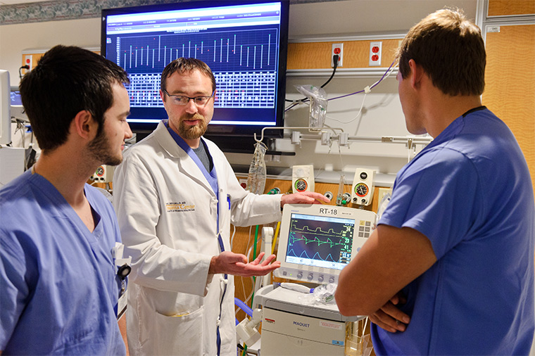 Photo of residents with attending physician.