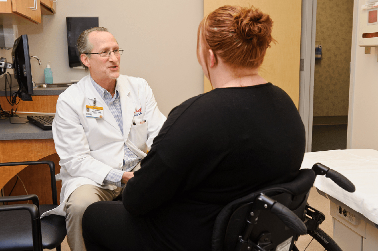 photo of Dr. Wolf and patient