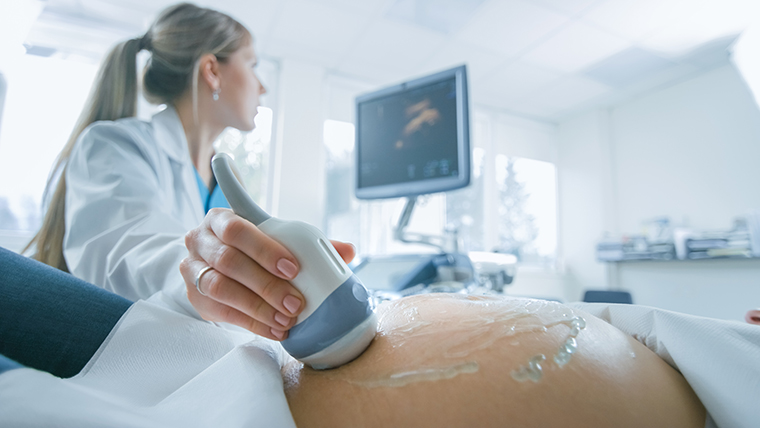 woman getting a fetal ultrasound