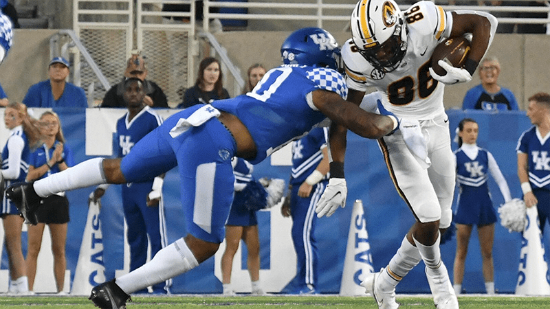 Photo of Kentucky’s Jaquez Jones tackling Missouri’s Tauskie Dove on Sept. 11 at Kroger Field in Lexington, Ky. Kentucky beat Missouri 35-28. OLIVIA ANDERSON/MISSOURIAN