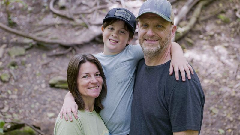 Joni with her husband and son.
