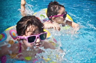 kids swimming in the pool 