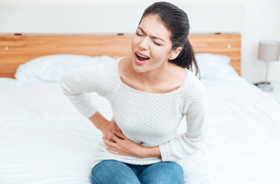 Woman with upset stomach