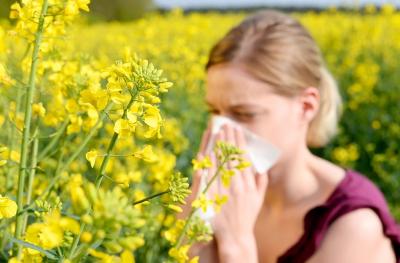 Woman sneezing