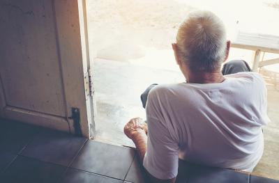 photo of man sitting alone