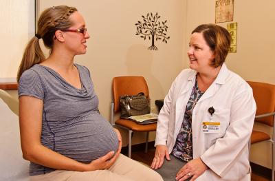 Pregnant patient with doctor