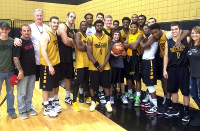 photo of Joshua Tucker and basketball players