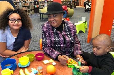 Photo of Kathryn Lee and grandchildren