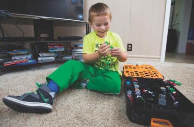 Ely Hamilton, 4, plays at his home in Aurora, Missouri.