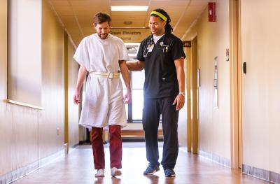 Eric Kelly, RN with patient