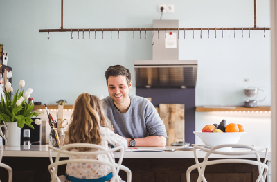 Photo of dad and daughter at breakfast