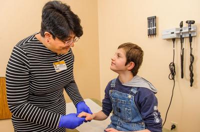 Dr Patwardhan with pediatric rheumatology patient