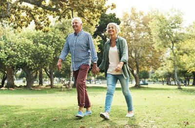 Photo of older couple walking