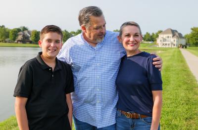 Christie McCullough walks with her family