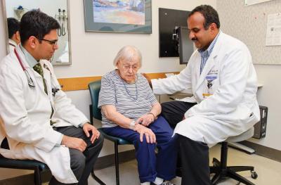 photo of doctors with patient