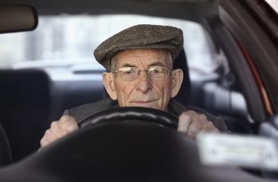 elderly man driving