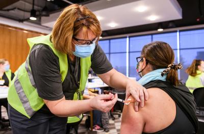 Person receiving the COVID-19 vaccination