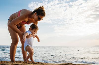 mother and child on the beach