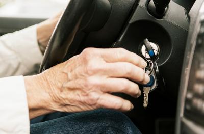 elderly person driving