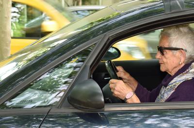 elderly woman driving