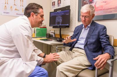 Dr. Brett Crist with a patient